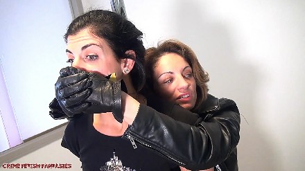 woman in leather jacket and leather gloves handsmother and strangling