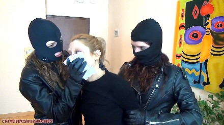 woman chloroformed by another two masked women in leather