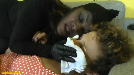 two girls chloroformed by a woman in mask and leather gloves