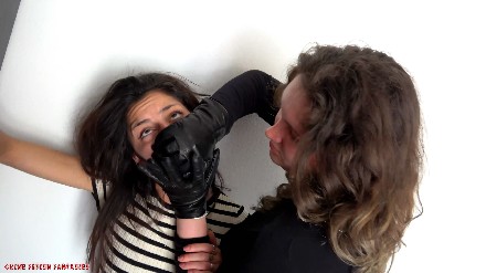 woman woman handsmother with black leather gloves